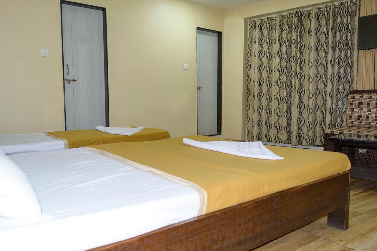 Hotel Mukesh Residency Пуна Экстерьер фото